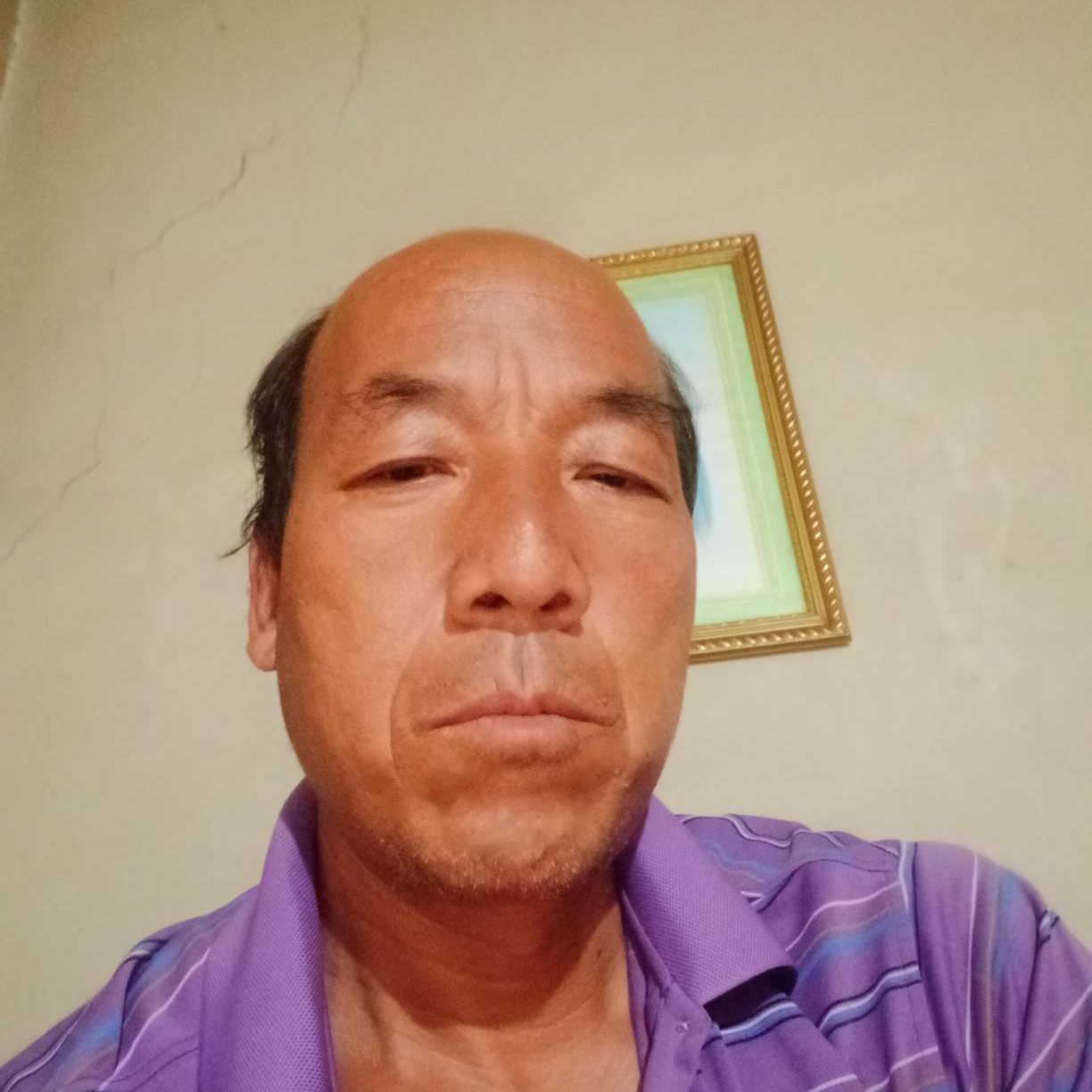 尊云拿落后的照片