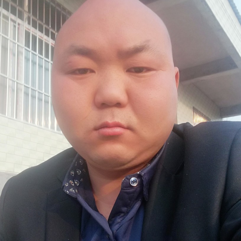 眯眯眼水壶的照片