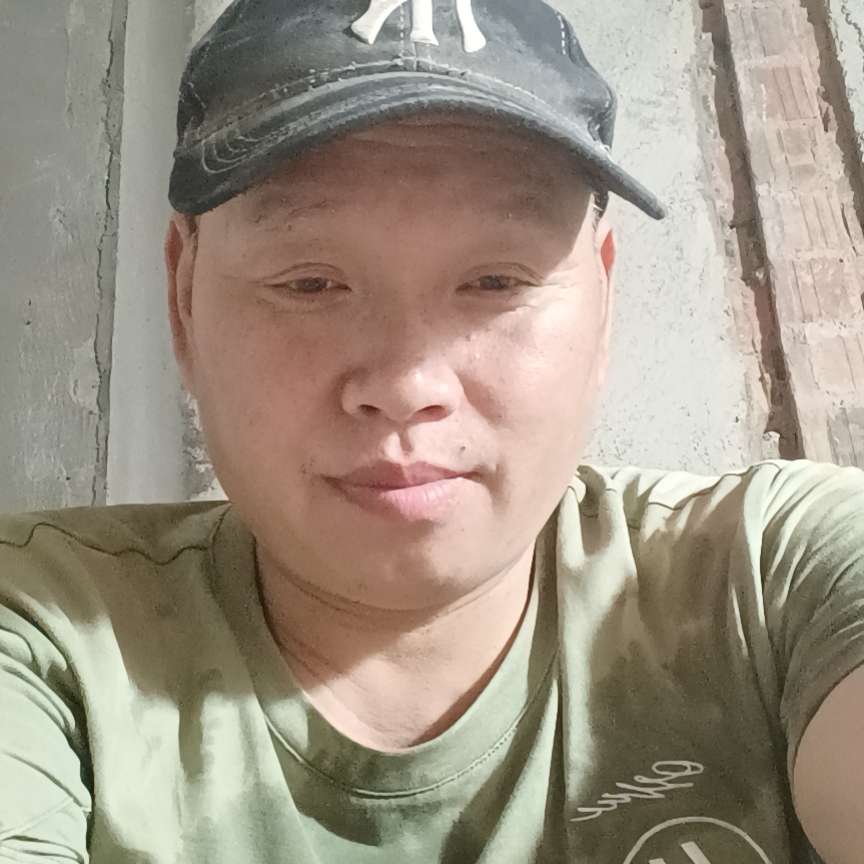 孤独拿毛豆的照片