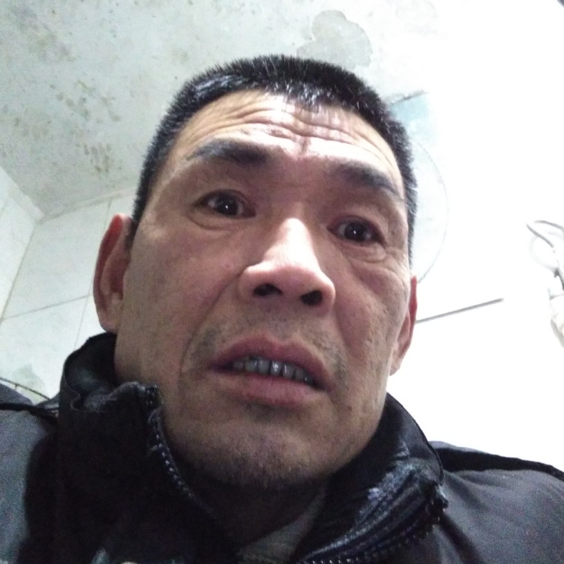 张望成的照片