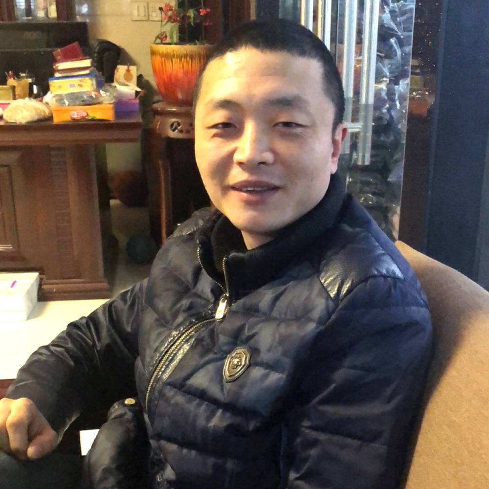 奇异果眯眯眼的照片
