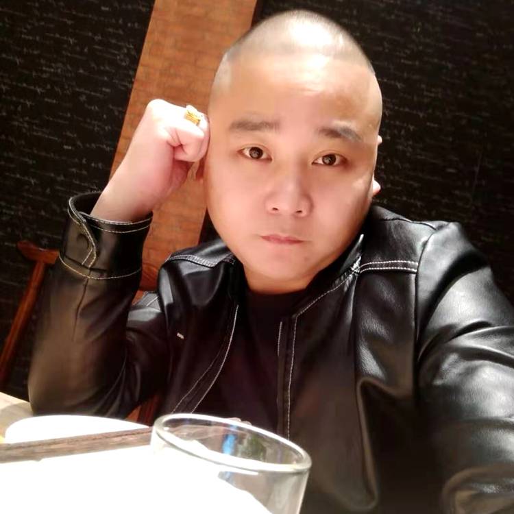 哥的微笑的照片