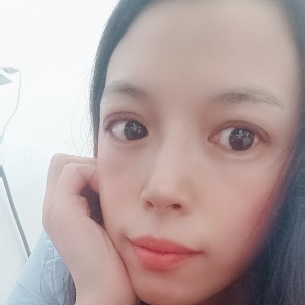 甜美那青衣的照片