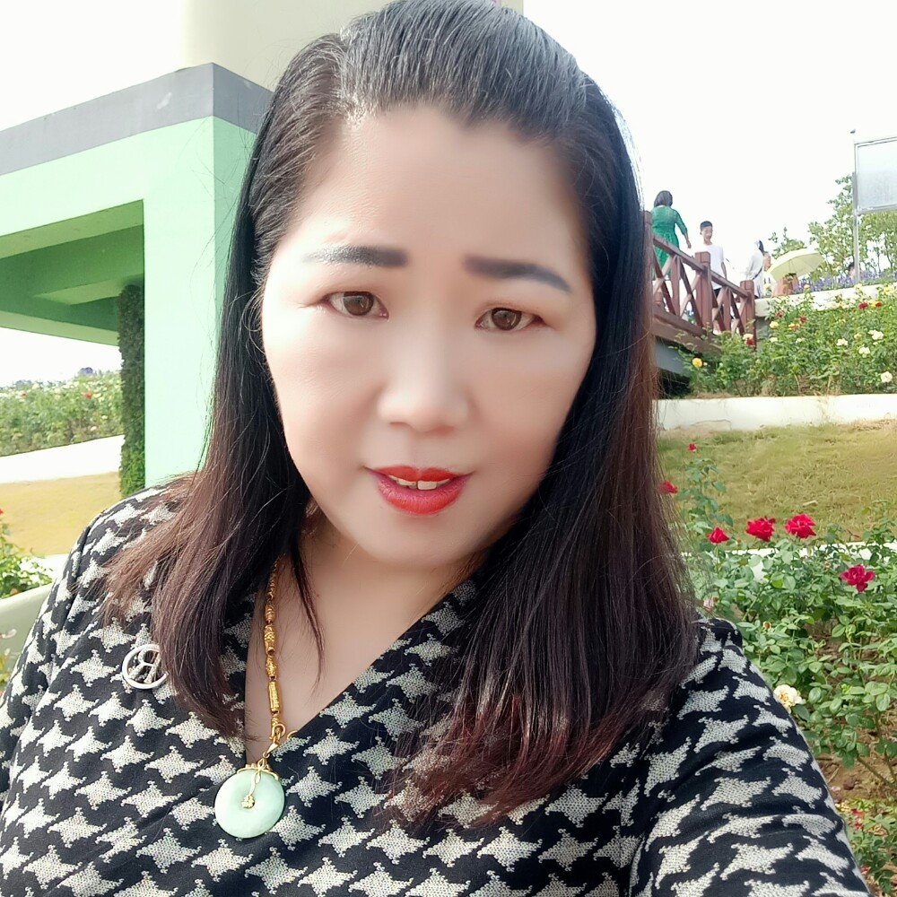 笑点低拿茉莉的照片