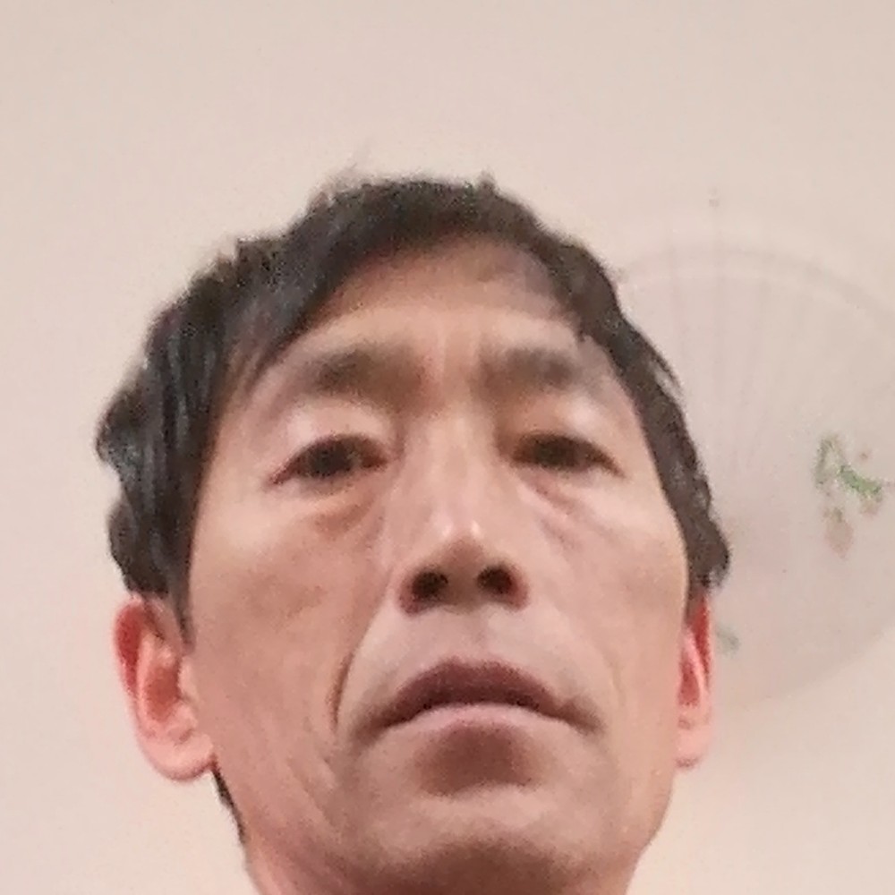 顺利拿狗的照片