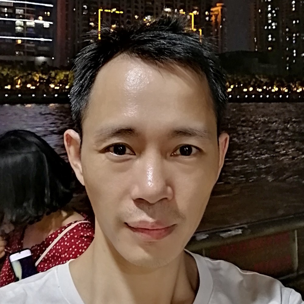 爆米花闻明理的照片