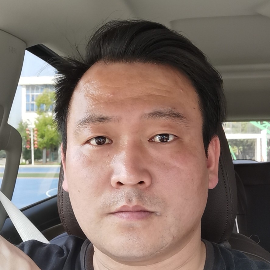 楼房拿明理的照片