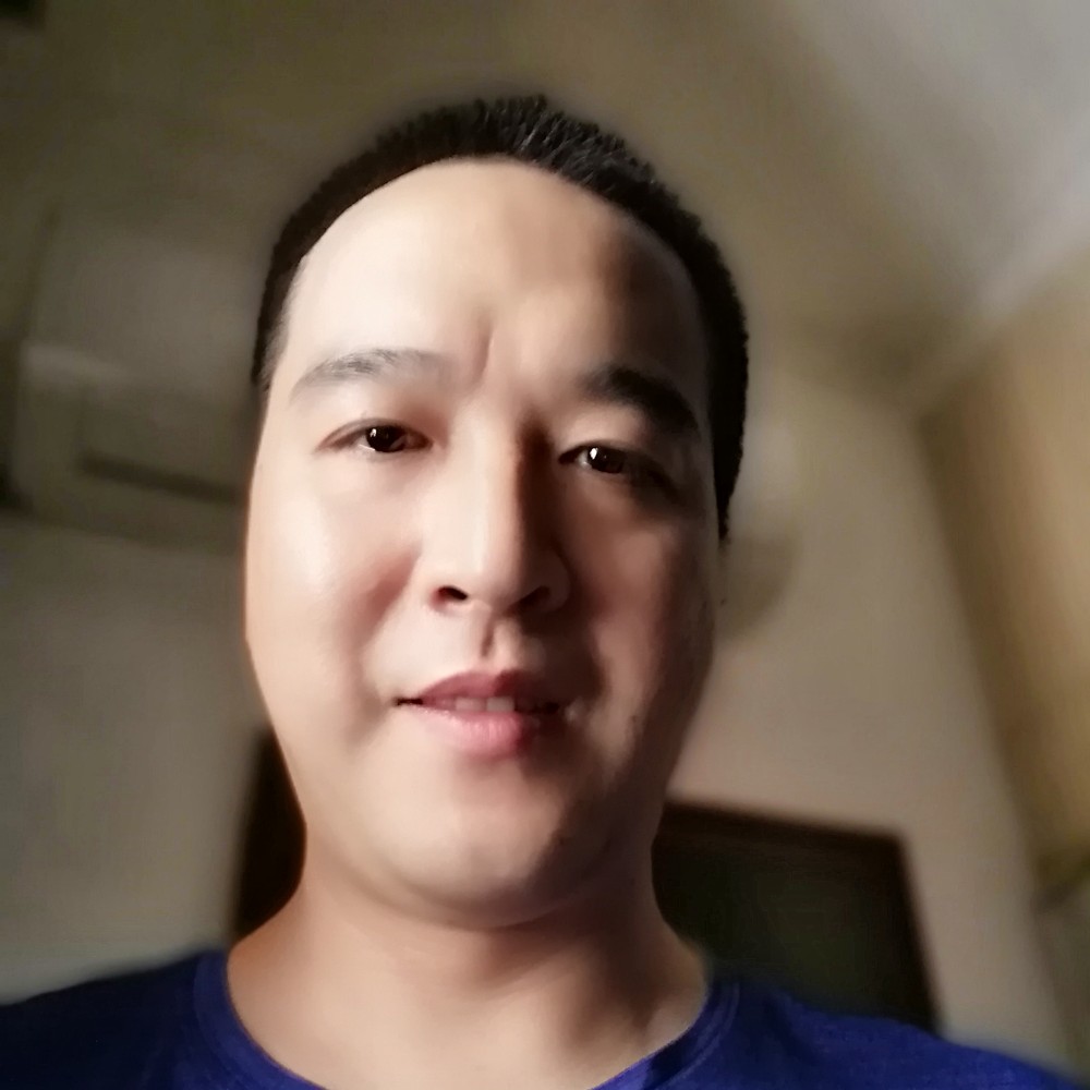 暖阳打眯眯眼的照片