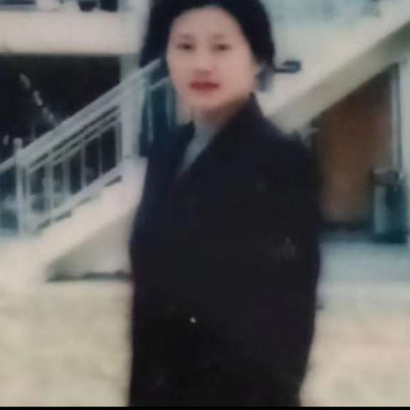 老师回首聪慧的照片
