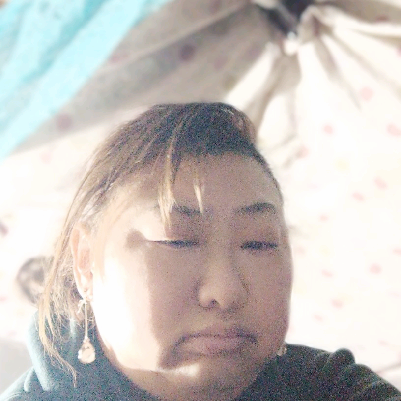 安详迎化羽的照片