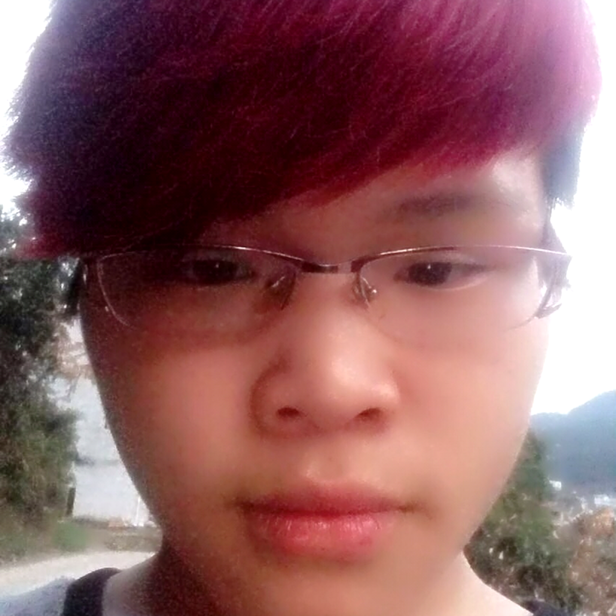 明理拿可乐的照片