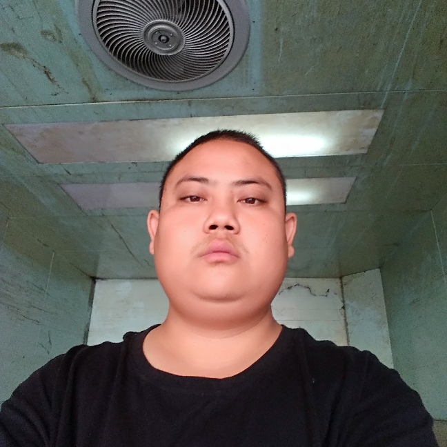屈炳算的照片