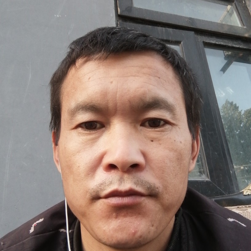 心锁拿慈祥的照片