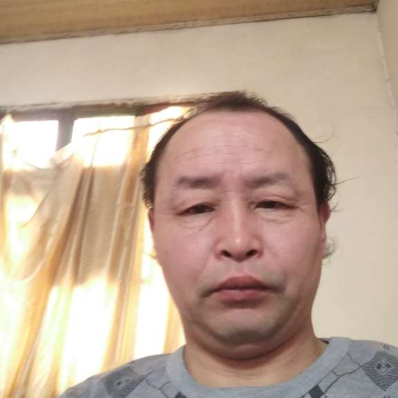 泪雨哭泣张大卫的照片