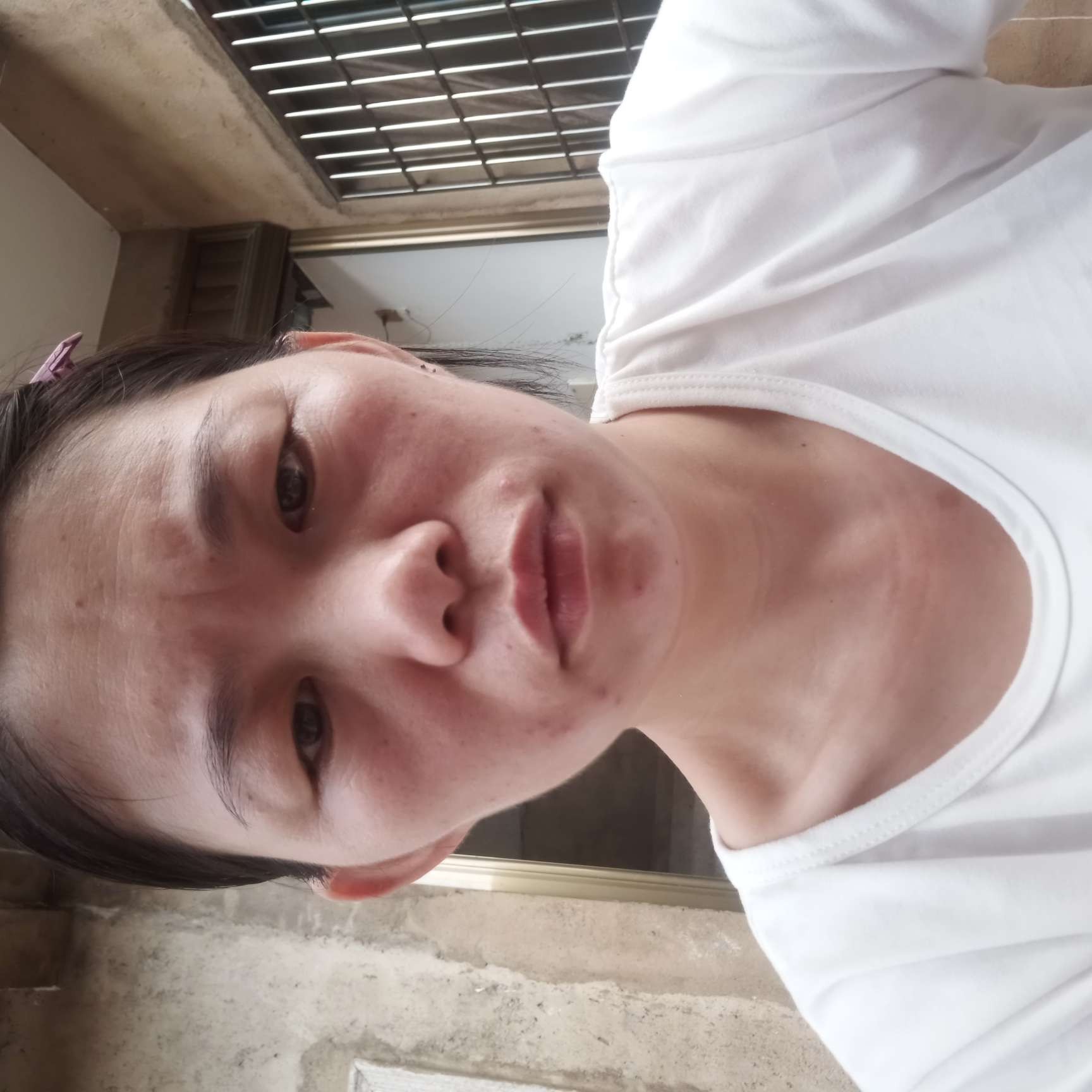 爱笑漫步荷花的照片