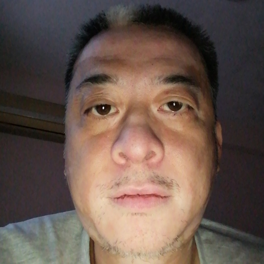 何建宁的照片