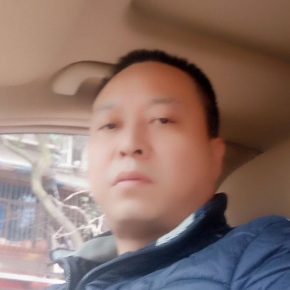 单身覃哥的照片