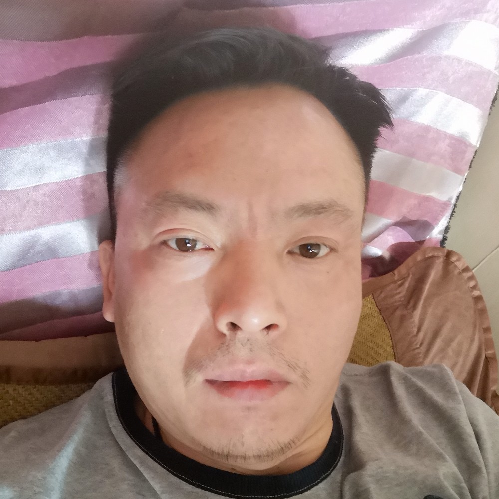明媚苦恋的照片