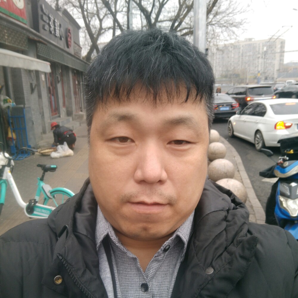 有故事的大叔的照片