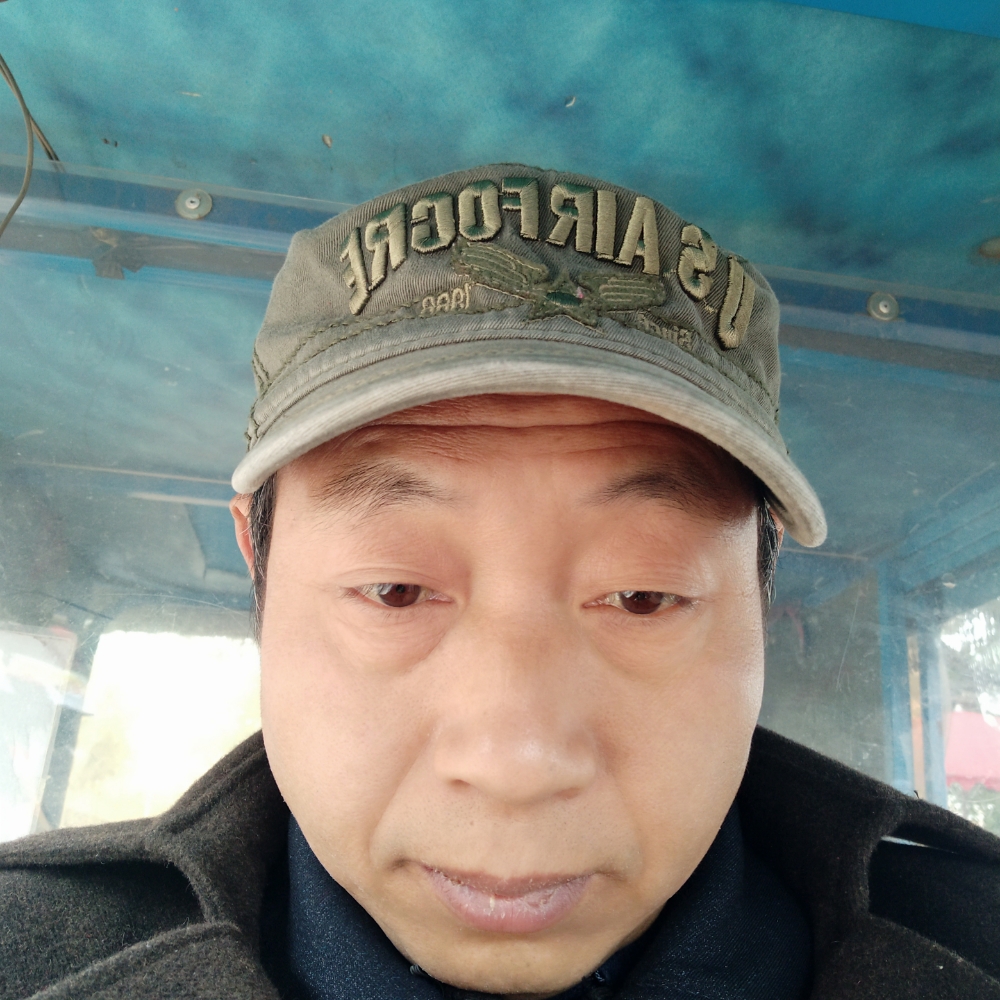 邓本奎的照片