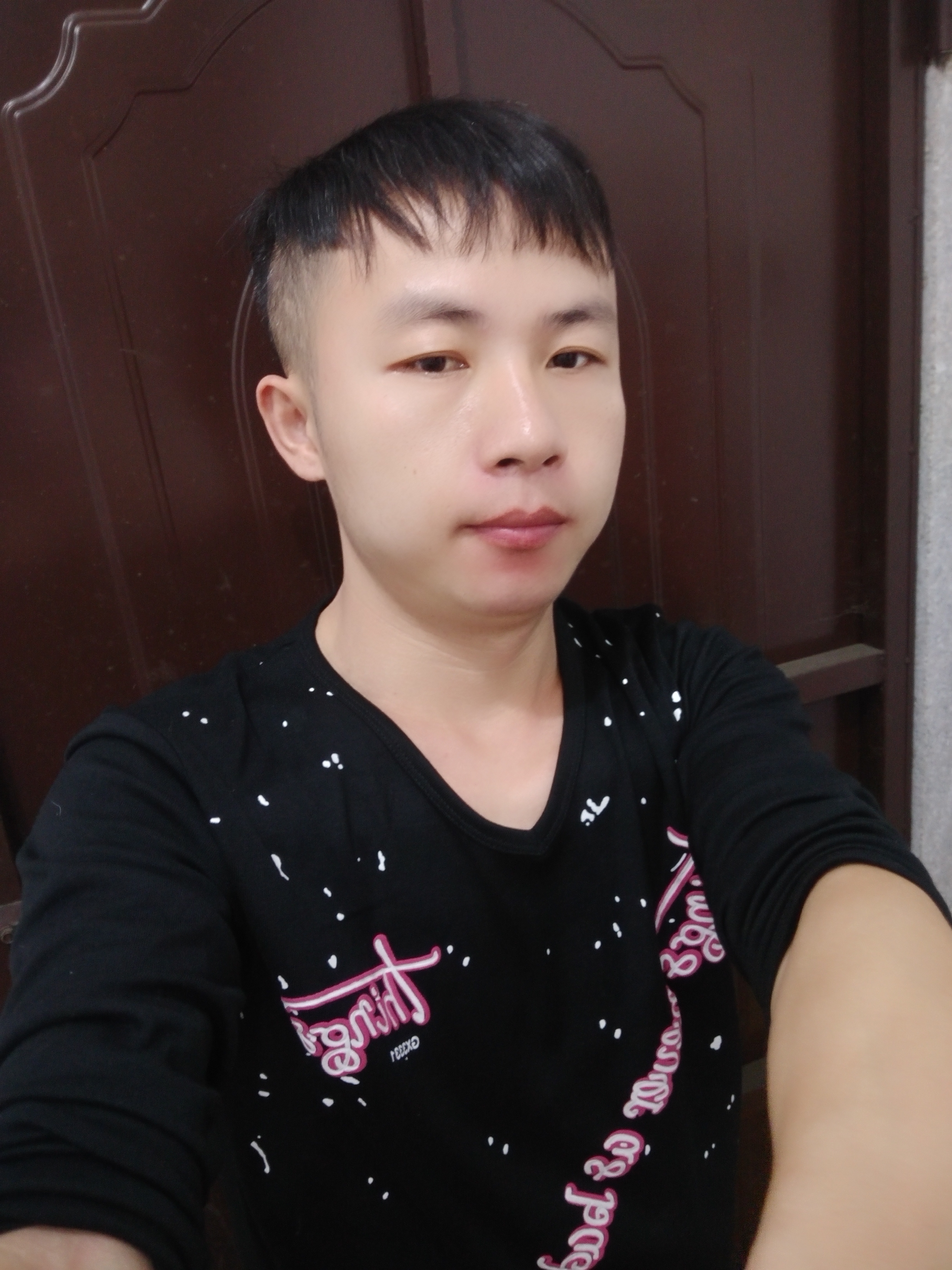 亮仔的照片