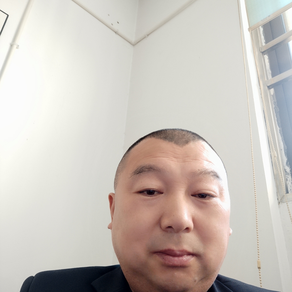 殷纳忠的照片